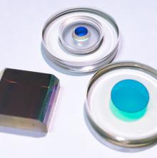 Moated ring laser gyro mirrors