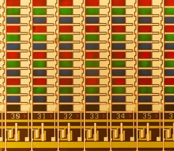Editorial_PhotonicsSpectra_FlatPanelDisplayHighMag.jpg Flat panel inspection requires optics with excellent color correction for individual inspection of red, green, and blue pixels, without the need to refocus, regardless of which pixel color is active.